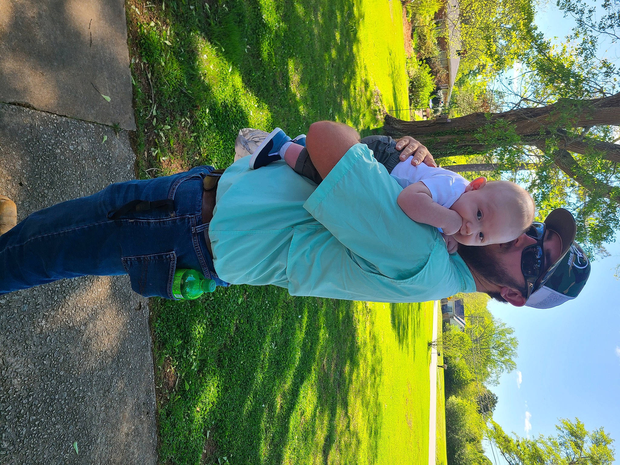 Reid joined the competition — help win amazing prizes! denim, elbow, electric_blue, fun, grass, happy, hat, headwear, landscape, leaf, leisure, people_in_nature, person, plant, recreation, shadow, shrub, sky, t_shirt, tree