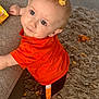 Rivver is registered to the contest to win money with this photo: toddler, child, orange_shirt, couch, carpet, snack, cheese_crisps, crumbs, indoor, curious, climbing, happy, face, person, home, floor, shorts, barefoot, playful, messy