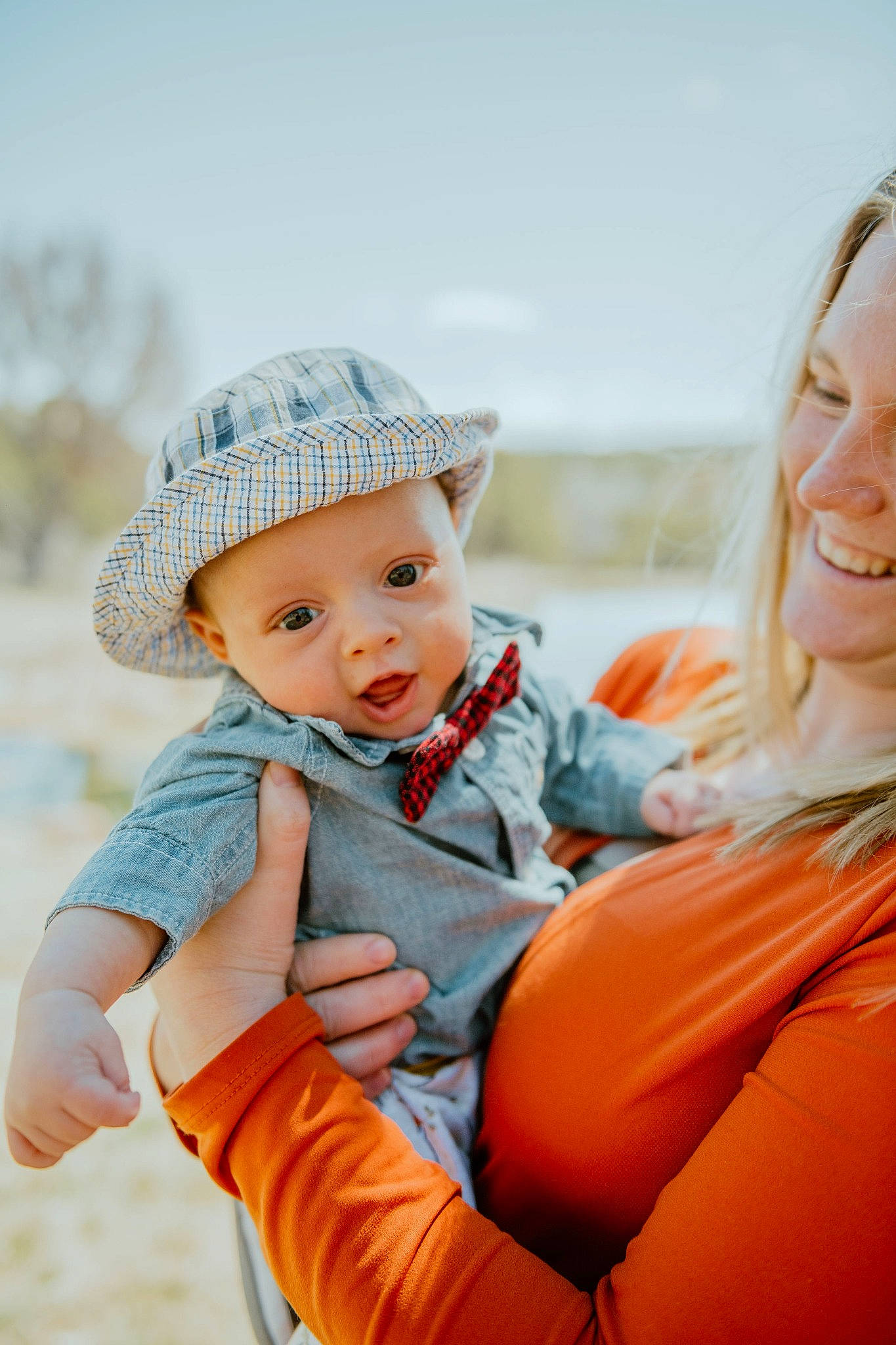 Koda joined the competition — help win amazing prizes! baby, baby_toddler_clothing, cap, child, fashion_accessory, fun, gesture, grass, happy, hat, headgear, headwear, joy, leisure, outerwear, people_in_nature, person, product, recreation, sitting