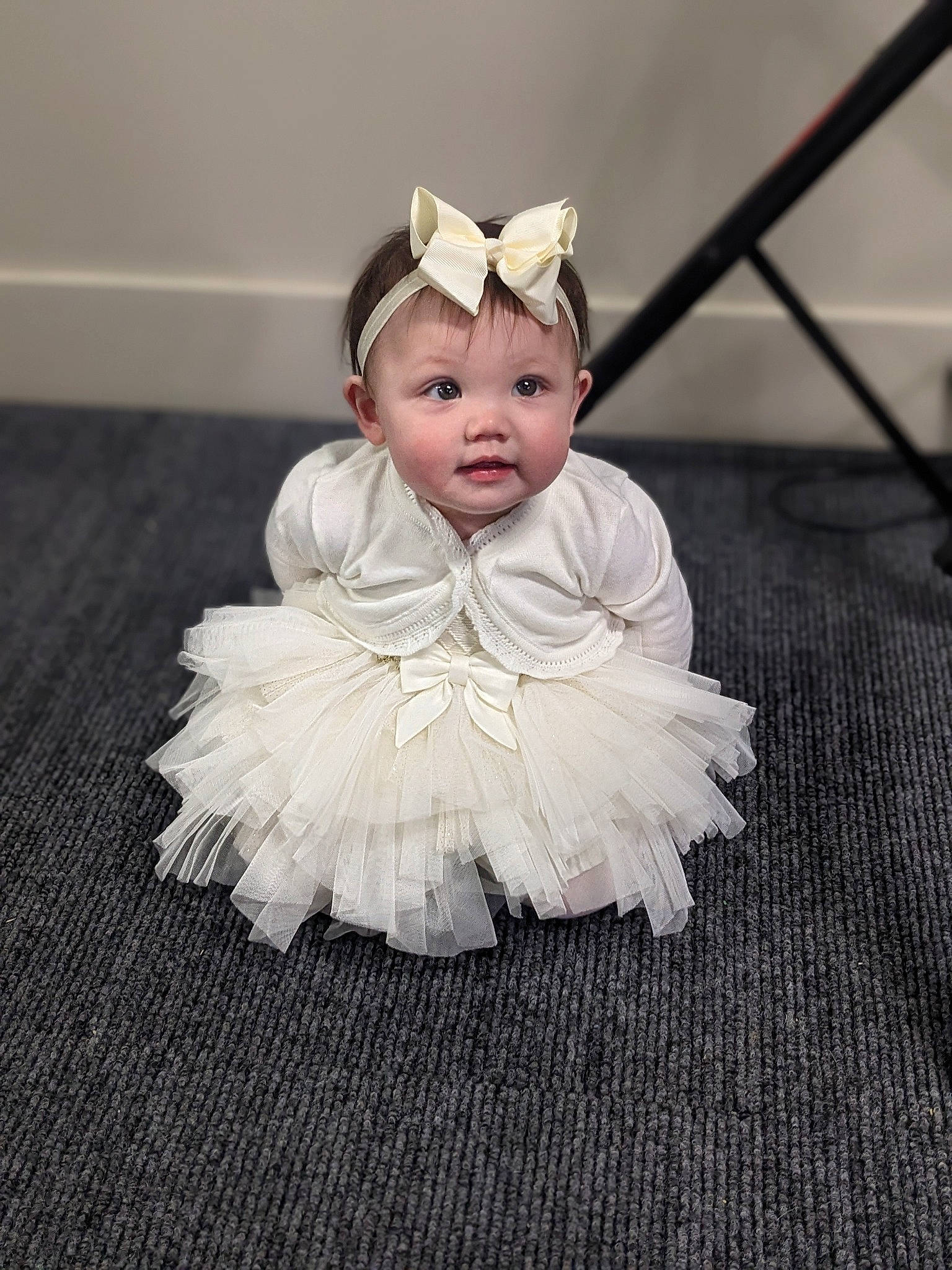 Gwynneth is registered to the contest to win money with this photo: baby, baby_toddler_clothing, bridal_accessory, costume, dress, embellishment, eye, face, fashion_accessory, flash_photography, flooring, hair_accessory, happy, head, headband, headpiece, iris, jewellery, person, toddler