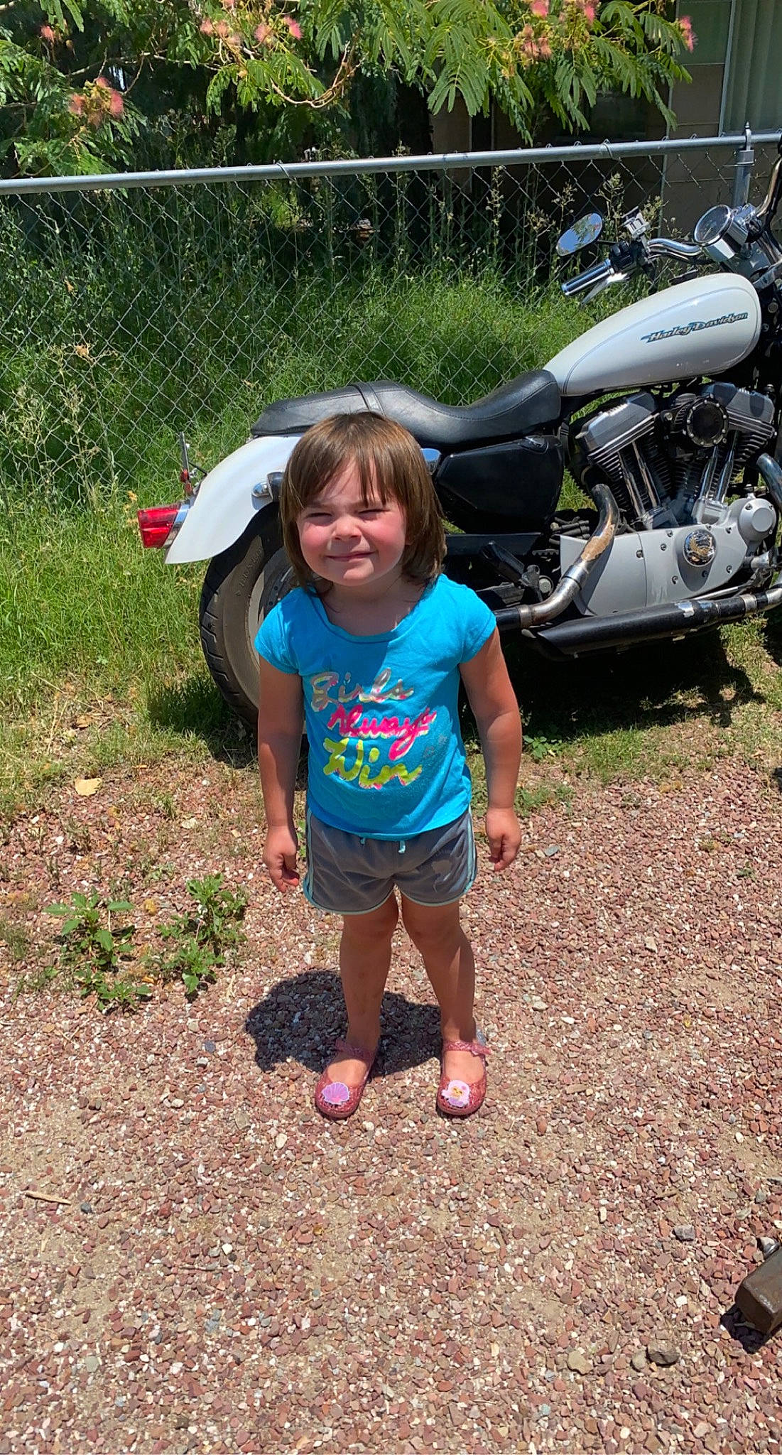 Cassie Pettit joined the competition — help win amazing prizes! auto_part, automotive_exterior, automotive_lighting, automotive_tire, automotive_wheel_system, fun, grass, happy, headlamp, joy, leisure, motor_vehicle, person, plant, recreation, sandal, shorts, smile, soil, t_shirt