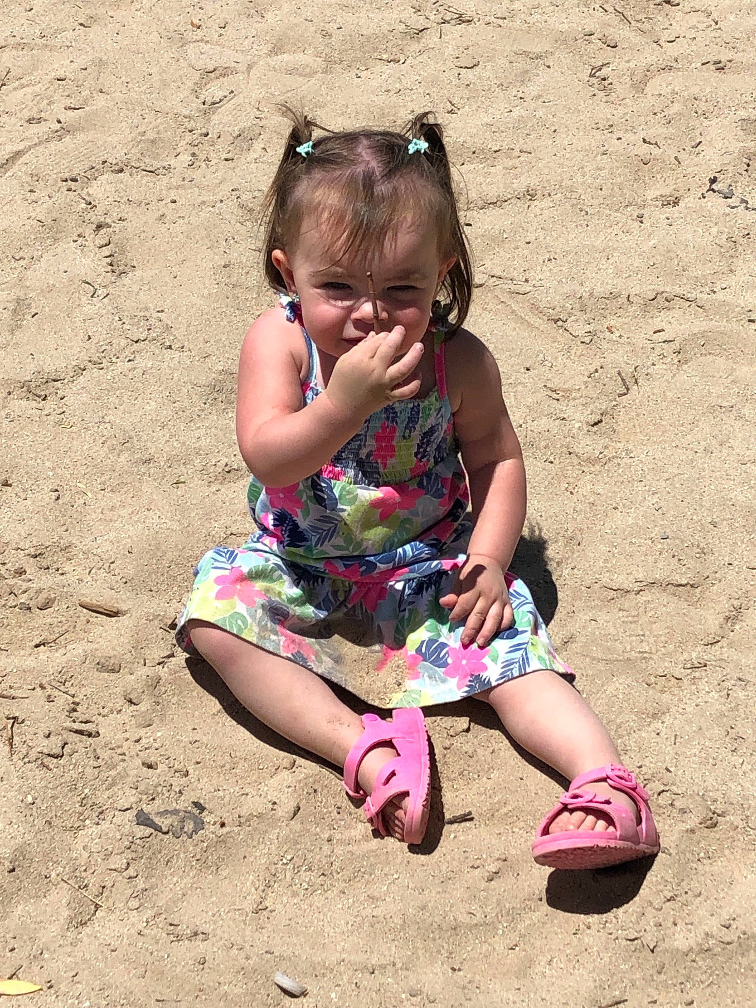 Cassie is registered to the contest to win money with this photo: adaptation, child, eyewear, fawn, fun, glasses, happy, joy, leg, person, pink, play, sand, sitting, smile, soil, summer, toddler, vacation