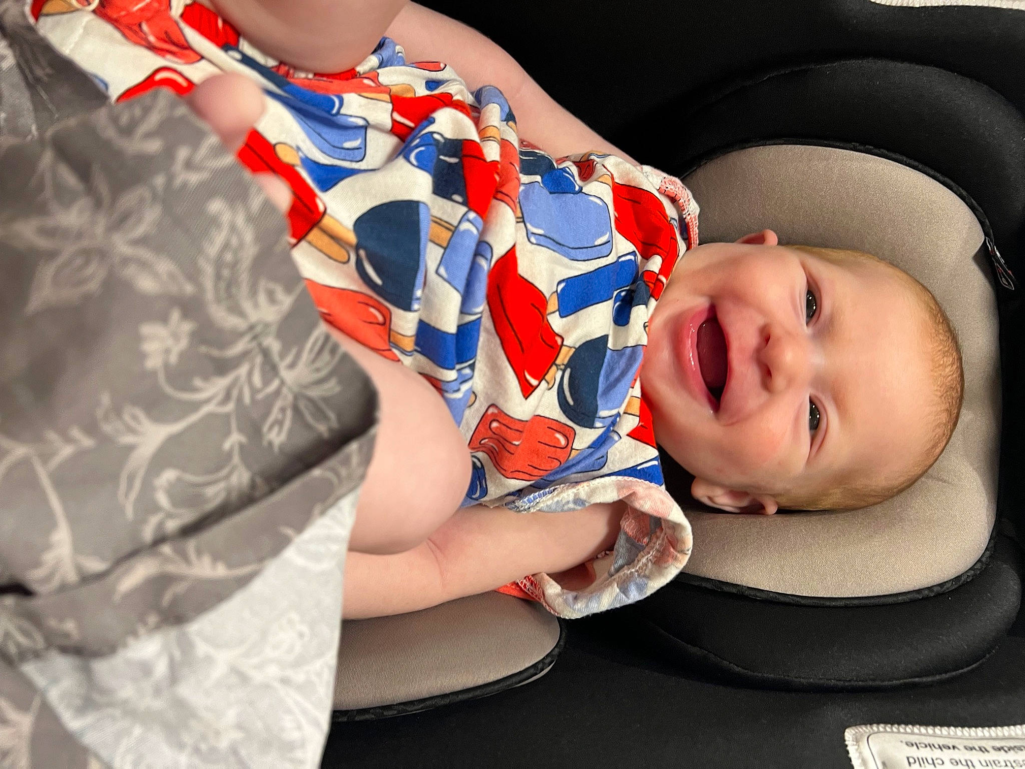 Presley is registered to the contest to win money with this photo: baby, baby_laughing, baby_toddler_clothing, cheek, chin, comfort, elbow, electric_blue, fun, happy, headgear, human_body, lip, mouth, neck, pattern, person, sitting, sleeve, smile