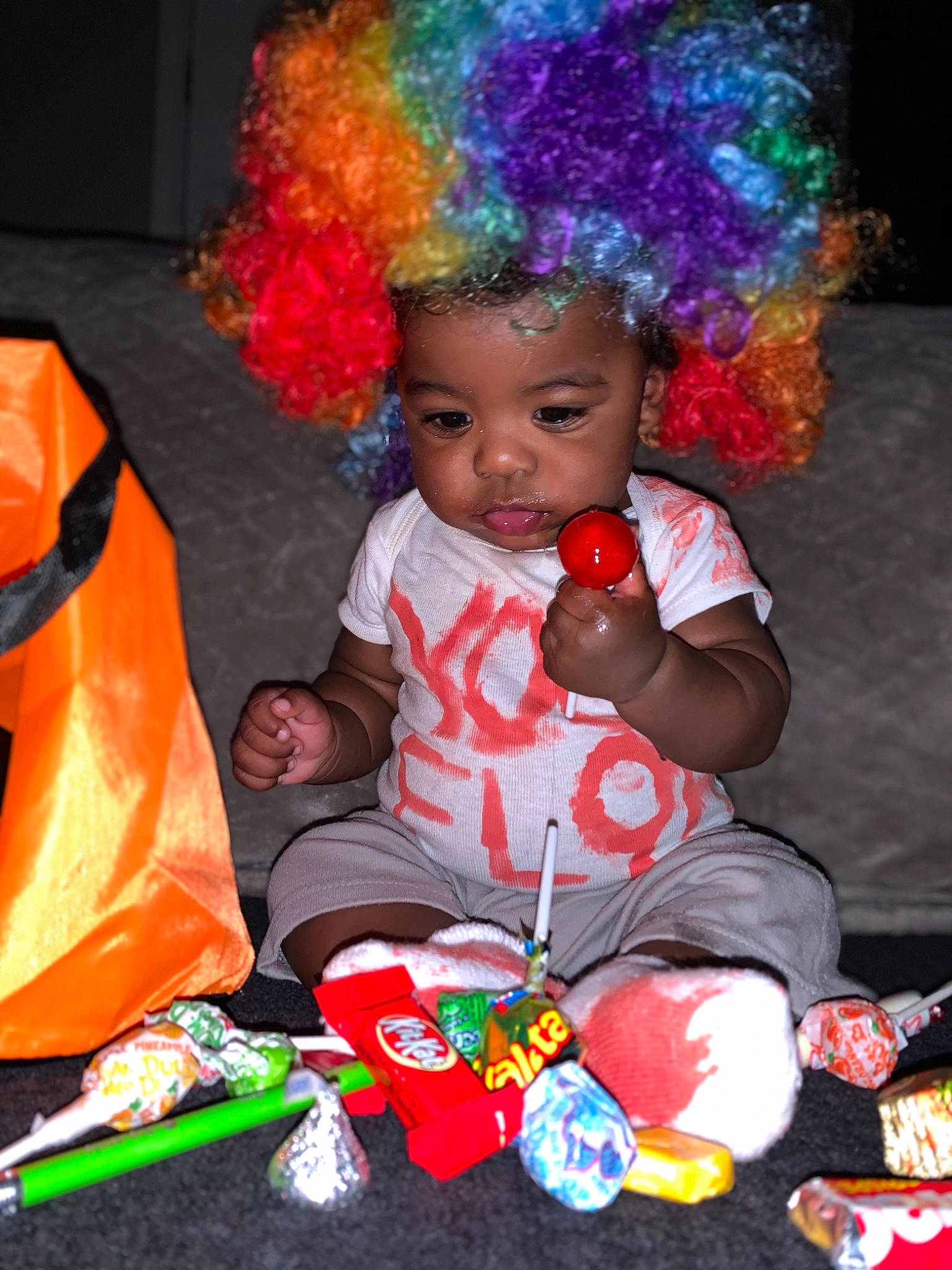 Kamarion joined the competition — help win amazing prizes! afro, baby, baby_products, baby_toddler_clothing, carmine, child, christmas, event, fashion_accessory, fun, happy, head, headwear, holiday, party_supply, person, red, sitting, smile, sweetness