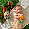 baby, blanket, carrot, child, cute, decor, easter, eggs, fabric, green, happy, indoors, lying_down, orange, pastel_colors, playful, portrait, smiling, soft_texture, toy