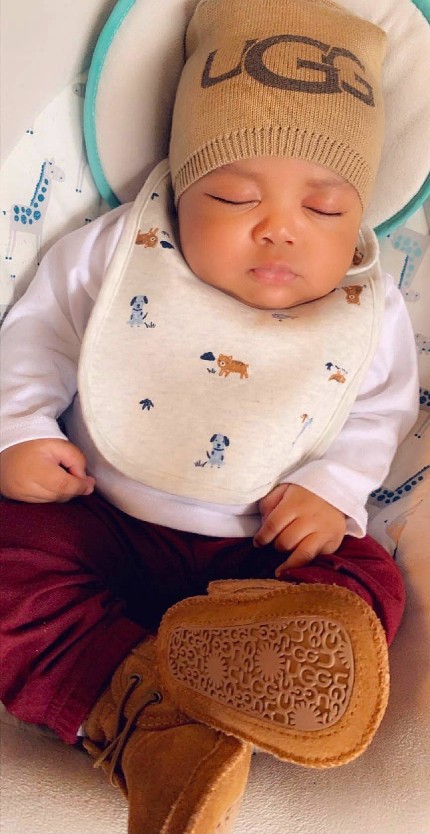 Kayden is registered to the contest to win money with this photo: baby, baby_sleeping, baby_toddler_clothing, cap, cheek, child, chin, collar, comfort, headwear, knit_cap, linens, lip, nose, person, sitting, skin, sleeve, toddler, white