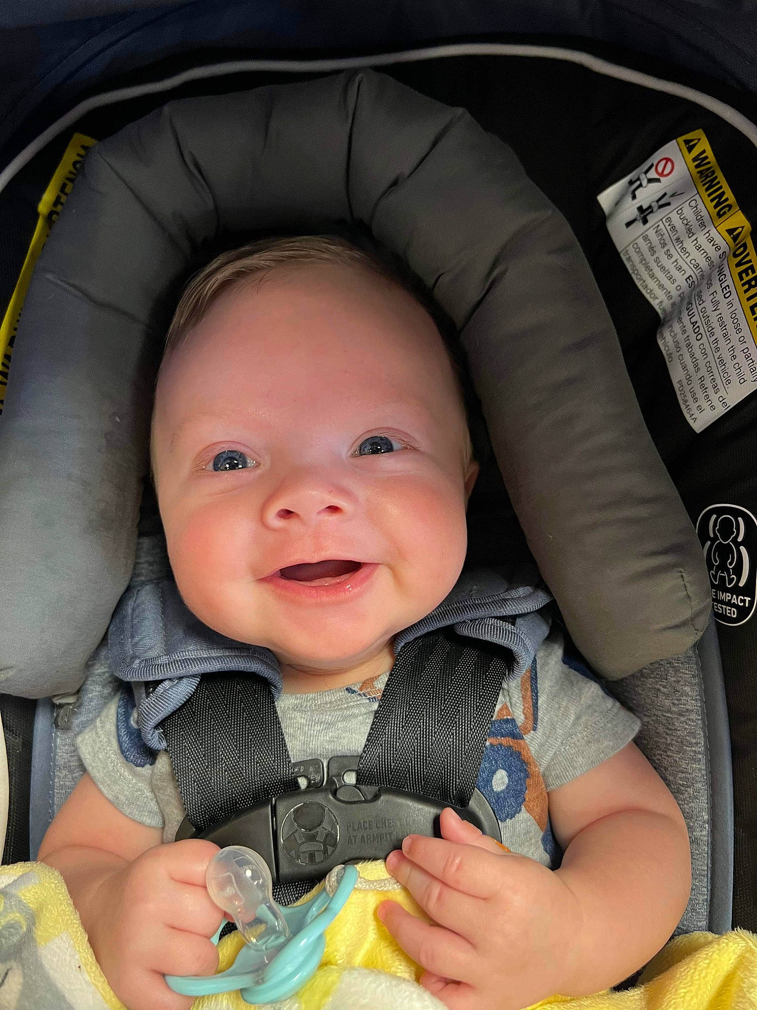 Karson is registered to the contest to win money with this photo: baby, baby_in_car_seat, baby_products, baby_toddler_clothing, car_seat, cheek, child, comfort, eye, face, facial_expression, happy, head, iris, mouth, nose, person, product, skin, smile