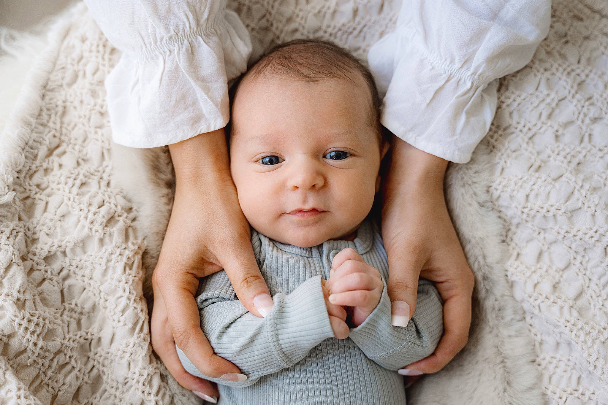 Hudson is registered to the contest to win money with this photo: arm, baby, baby_toddler_clothing, cheek, eye, eyelash, face, finger, flash_photography, gesture, hand, happy, iris, nose, people_in_nature, person, product, skin, toddler, white