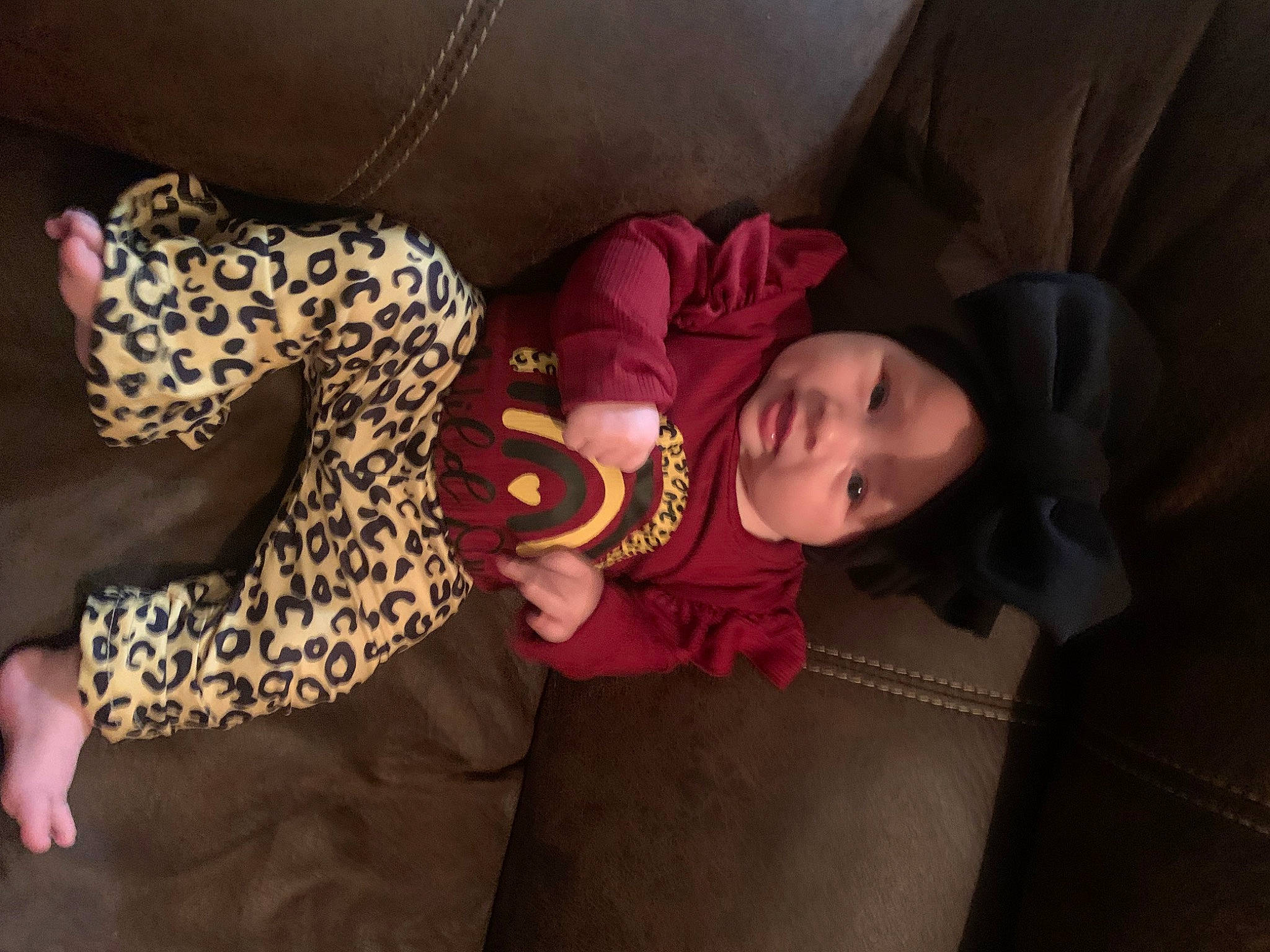 Octavia joined the competition — help win amazing prizes! baby, baby_toddler_clothing, child, comfort, darkness, event, floor, flooring, fun, fur, hat, headwear, magenta, person, room, sitting, sleeve, teddy_bear, toddler, tree