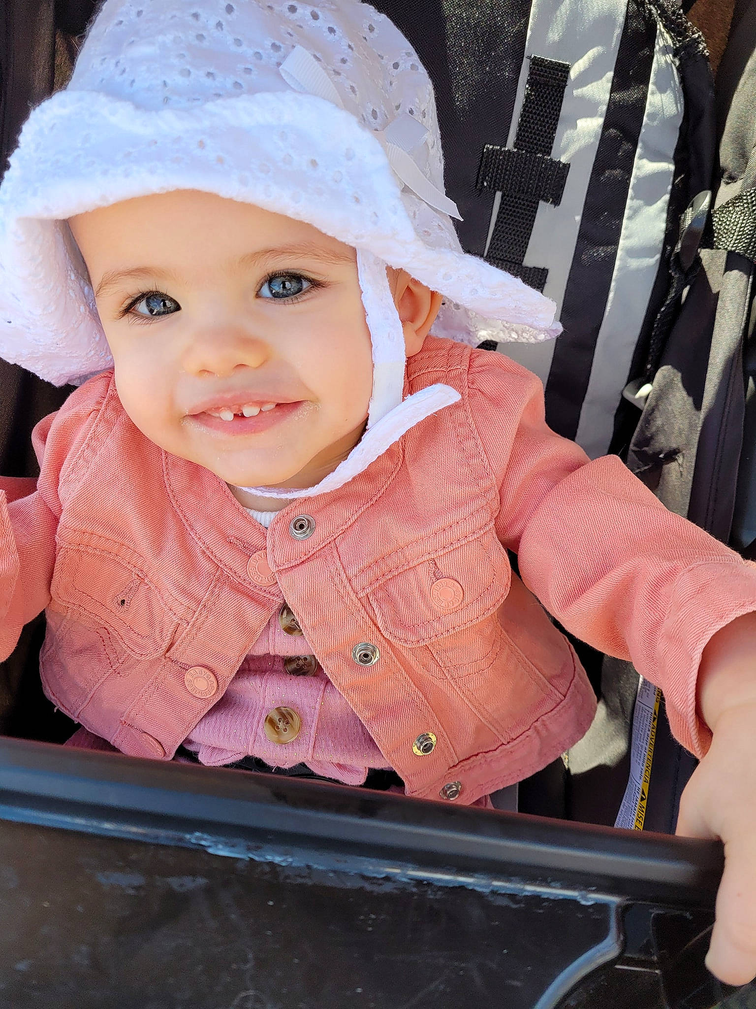 Meadow is registered to the contest to win money with this photo: baby, baby_carriage, baby_products, baby_toddler_clothing, beauty, cap, cheek, child, eye, fun, happy, headgear, headwear, lip, person, photograph, pink, product, skin, sleeve