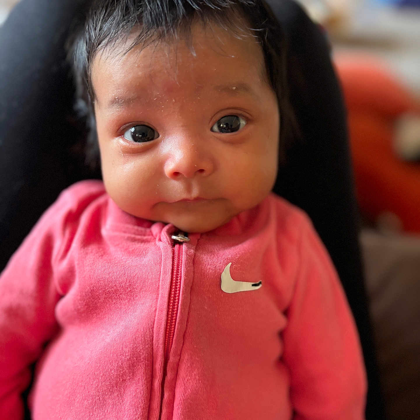 Isabella joined the competition — help win amazing prizes! adorable, baby, child, closeup, cute, expression, eyes, face, head, human, indoor, infant, person, pink_clothing, portrait, sitting, soft_focus, warm, young, zip_up