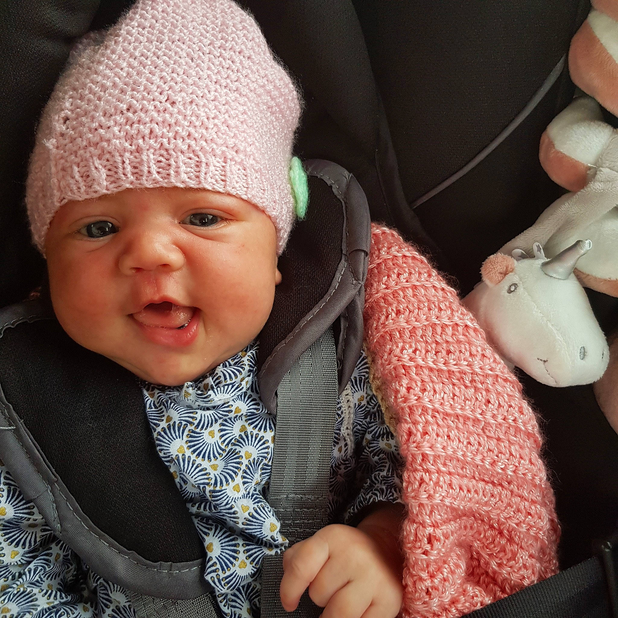 Nancy participe au concours pour gagner de l'argent avec cette photo : baby, bonnet, cheek, child, cool, crochet, face, finger, hand, hat, head, headgear, headwear, knit_cap, knitting, nose, person, pink, product, skin