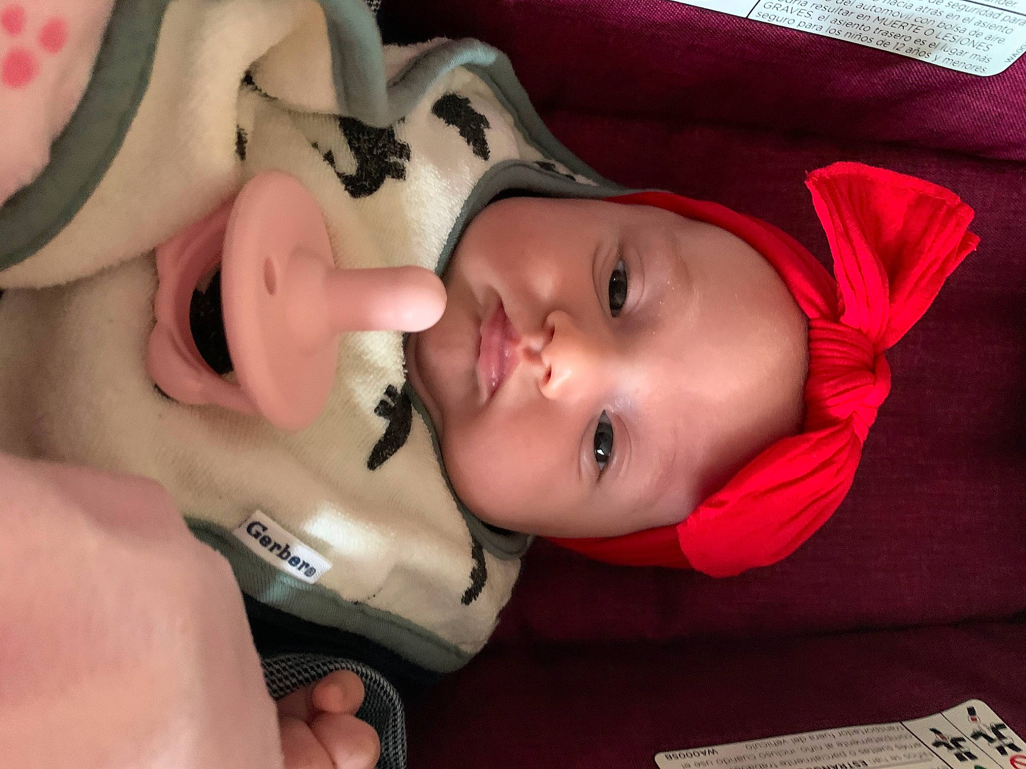 Aliza is registered to the contest to win money with this photo: baby, cheek, child, ear, eye, eyelash, finger, hand, head, headwear, lip, mouth, nail, nose, person, pink, skin, smile, toddler