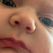 Mercy is registered to the contest to win money with this photo: baby, face, closeup, skin, nose, mouth, eyes, infant, child, portrait, pink, expression, cheeks, young, human, cute, person, blurry, innocent, curious