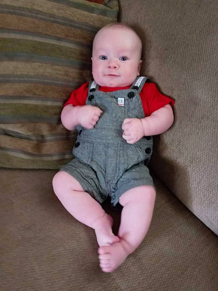 Braidyn joined the competition — help win amazing prizes! arm, baby, baby_toddler_clothing, cheek, comfort, dress, eye, flooring, grey, hand, human_body, iris, knee, leg, person, sleeve, t_shirt, textile, thumb, toddler