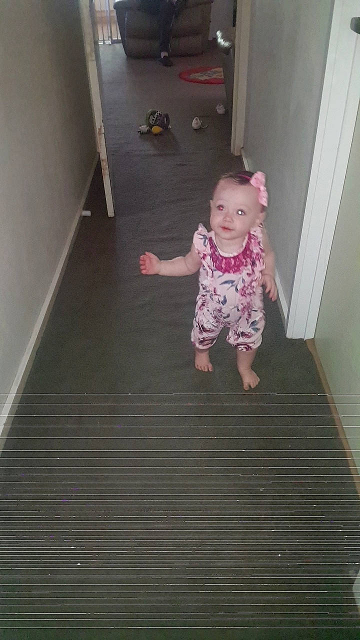 Summer is registered to the contest to win money with this photo: baby, child, floor, flooring, hardwood, person, room, stairs, standing, toddler, wood