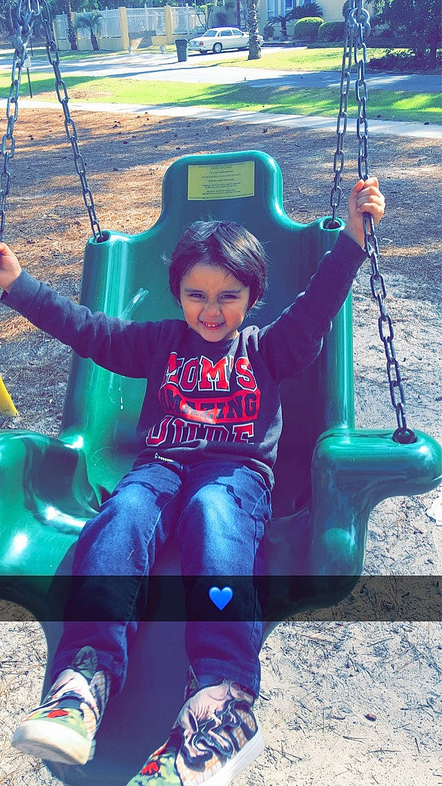 Lee joined the competition — help win amazing prizes! child, city, fun, happy, joy, leisure, outdoor_play_equipment, person, plant, play, playground, public_space, recreation, smile, summer, swing, t_shirt, toddler, tree, vacation