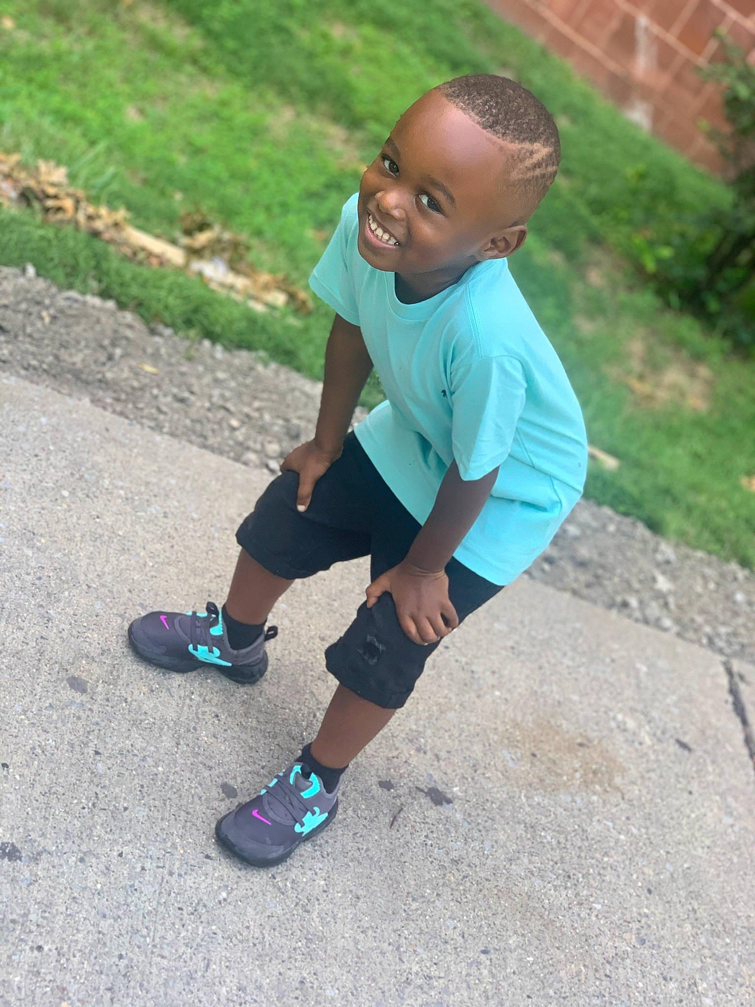 Nasir joined the competition — help win amazing prizes! asphalt, electric_blue, eye, face, footwear, grass, happy, head, joy, knee, leisure, person, plant, shirt, shorts, sleeve, smile, sock, street_fashion, t_shirt