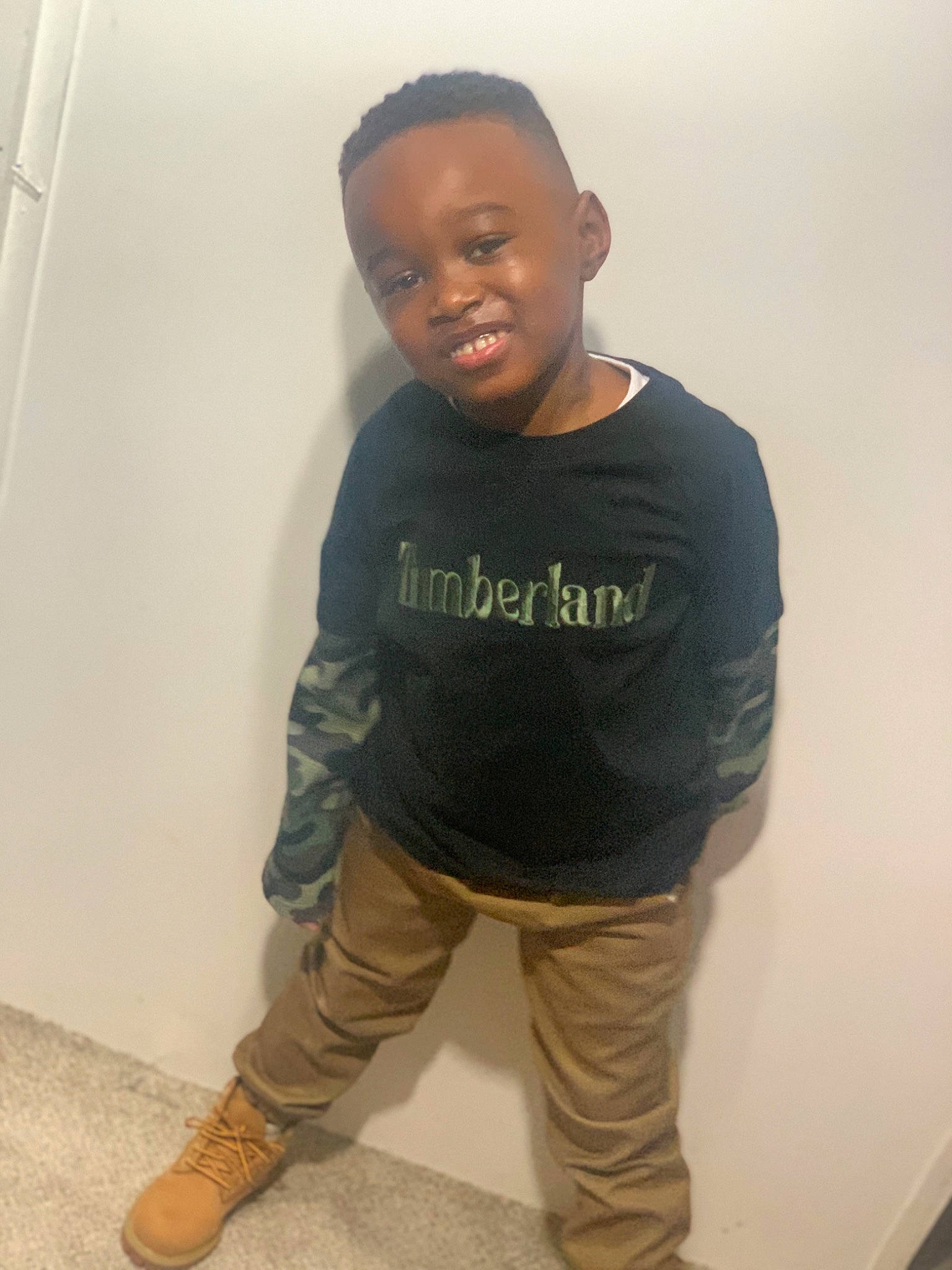 Nasir is registered to the contest to win money with this photo: cheek, denim, eyewear, face, fashion_design, flooring, forehead, fun, human_body, joy, long_sleeved_t_shirt, mouth, neck, nose, person, personal_protective_equipment, shoulder, sleeve, sportswear, t_shirt