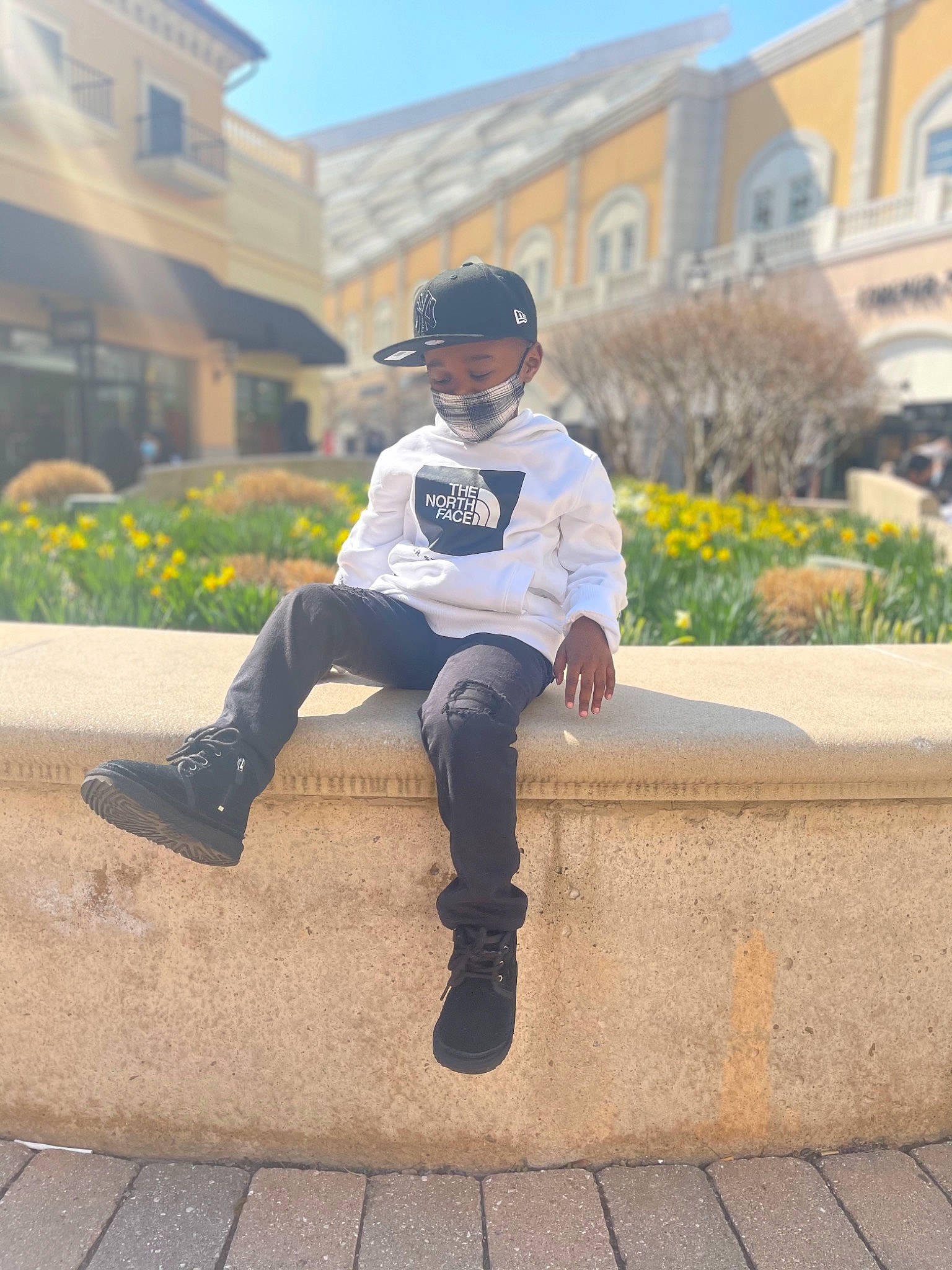 Nasir is registered to the contest to win money with this photo: asphalt, baseball_cap, building, cap, cool, denim, eyewear, footwear, glasses, hat, helmet, jeans, leg, leisure, person, plant, shoe, sneakers, street_fashion, sunglasses