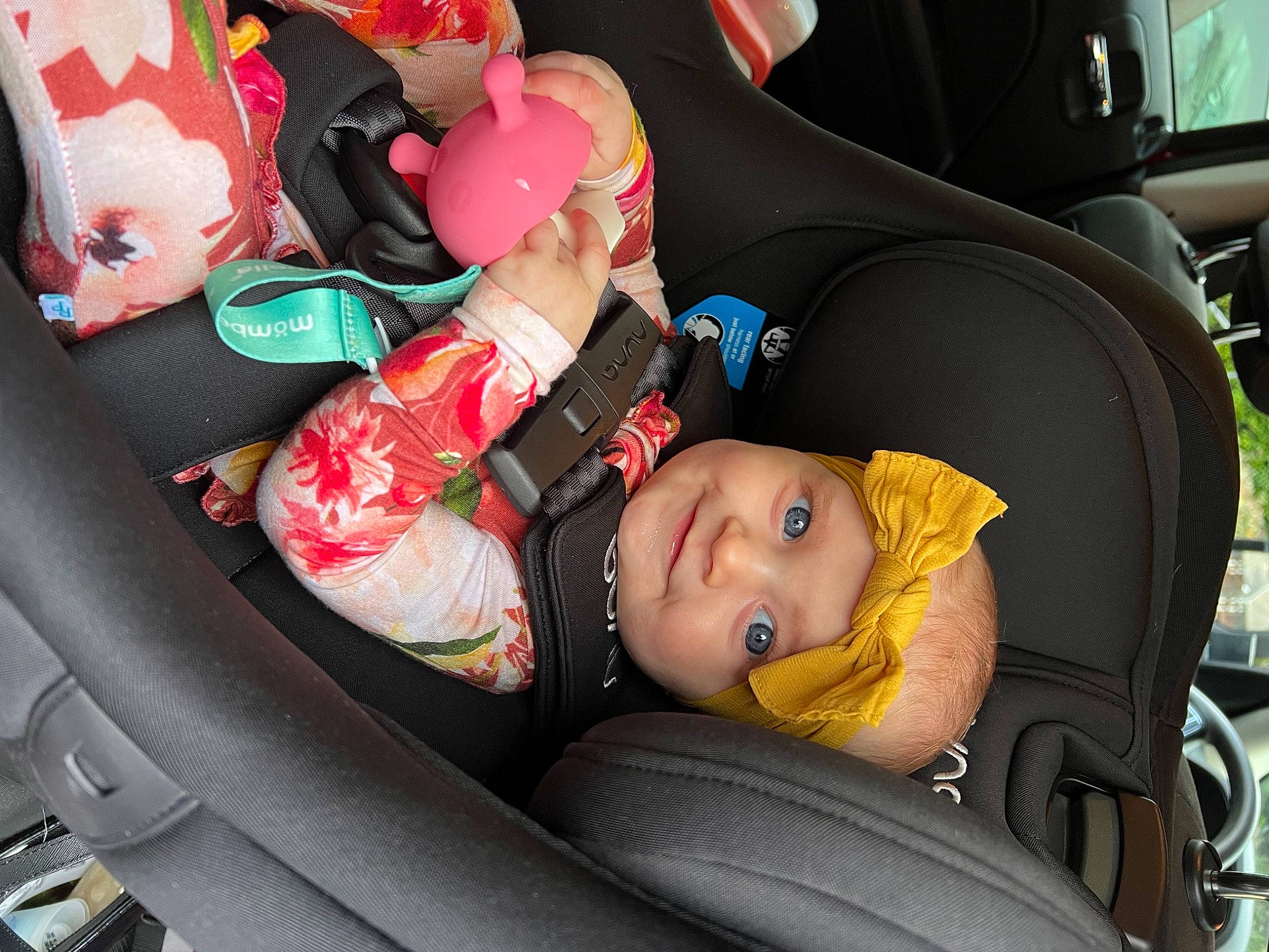 Preslee is registered to the contest to win money with this photo: auto_part, automotive_design, automotive_exterior, automotive_tire, baby, baby_carriage, baby_products, car_seat, car_seat_cover, child, comfort, family_car, head_restraint, headwear, luxury_vehicle, motor_vehicle, person, tire, toddler, vehicle