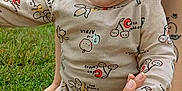 Braxton joined the competition — help win amazing prizes! baby, casual, child, cute, daylight, expression, footwear, grass, hand_holding, infant, legs, nature, onesie, outdoor, person, skin, standing, summer, support, tattoo