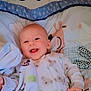 Braxton joined the competition — help win amazing prizes! baby, baby_bedding, bed, blanket, child, colorful, comfort, cute, happy, indoors, infant, koala_print, lying_down, onesie, plush_toy, portrait, sleepwear, smiling, soft, toy