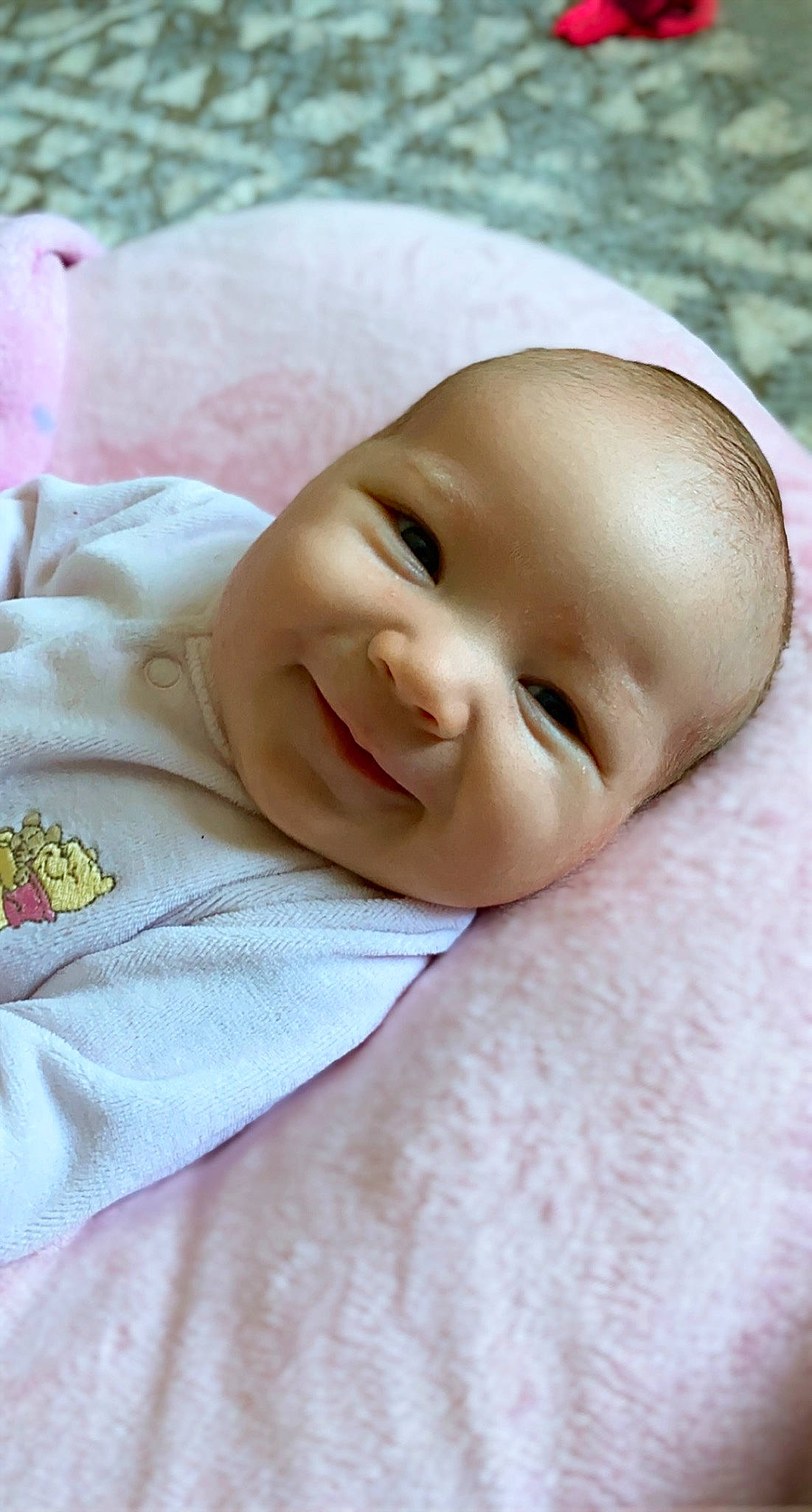 Arlowe is registered to the contest to win money with this photo: baby, baby_toddler_clothing, bedtime, cheek, child, comfort, eye, eyelash, grass, happy, joy, linens, lip, nose, person, portrait_photography, skin, sleeve, smile, toddler