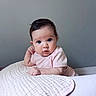 Amaya is registered to the contest to win money with this photo: baby, infant, child, portrait, cute, curious, quilted_blanket, pink_clothing, soft_texture, indoors, face, head, expression, resting, young, skin, hand, sleeping_area, blanket, peaceful