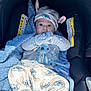 Maximiliano joined the competition — help win amazing prizes! baby, child, car_seat, blue_blanket, pajamas, hat, gloves, stitch_character, infant, cute, portrait, clothing, cozy, indoor, seat, person, newborn, apparel, resting, warm