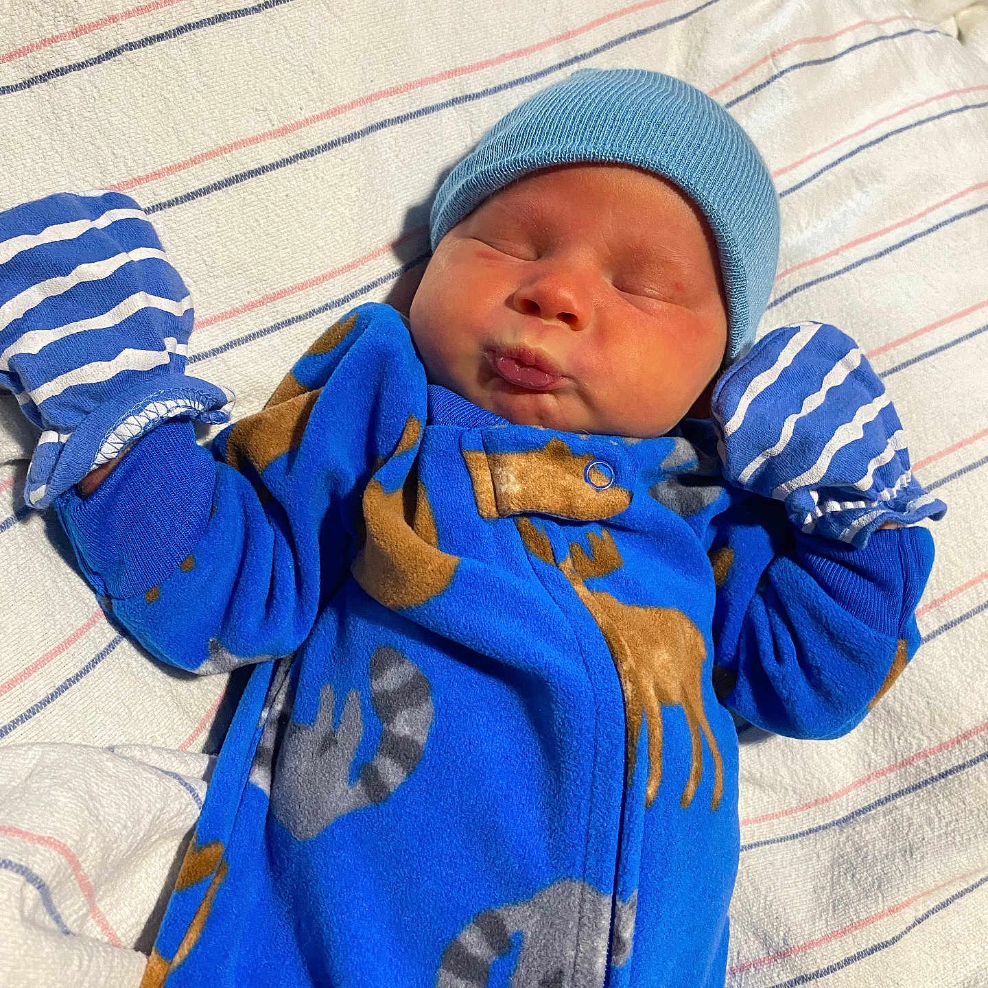 Levi is registered to the contest to win money with this photo: architecture, baby, bed, blanket, building, cap, clothing, face, furniture, glove, hat, head, hospital, newborn, person, photography, portrait, quilt, sleeping, towel