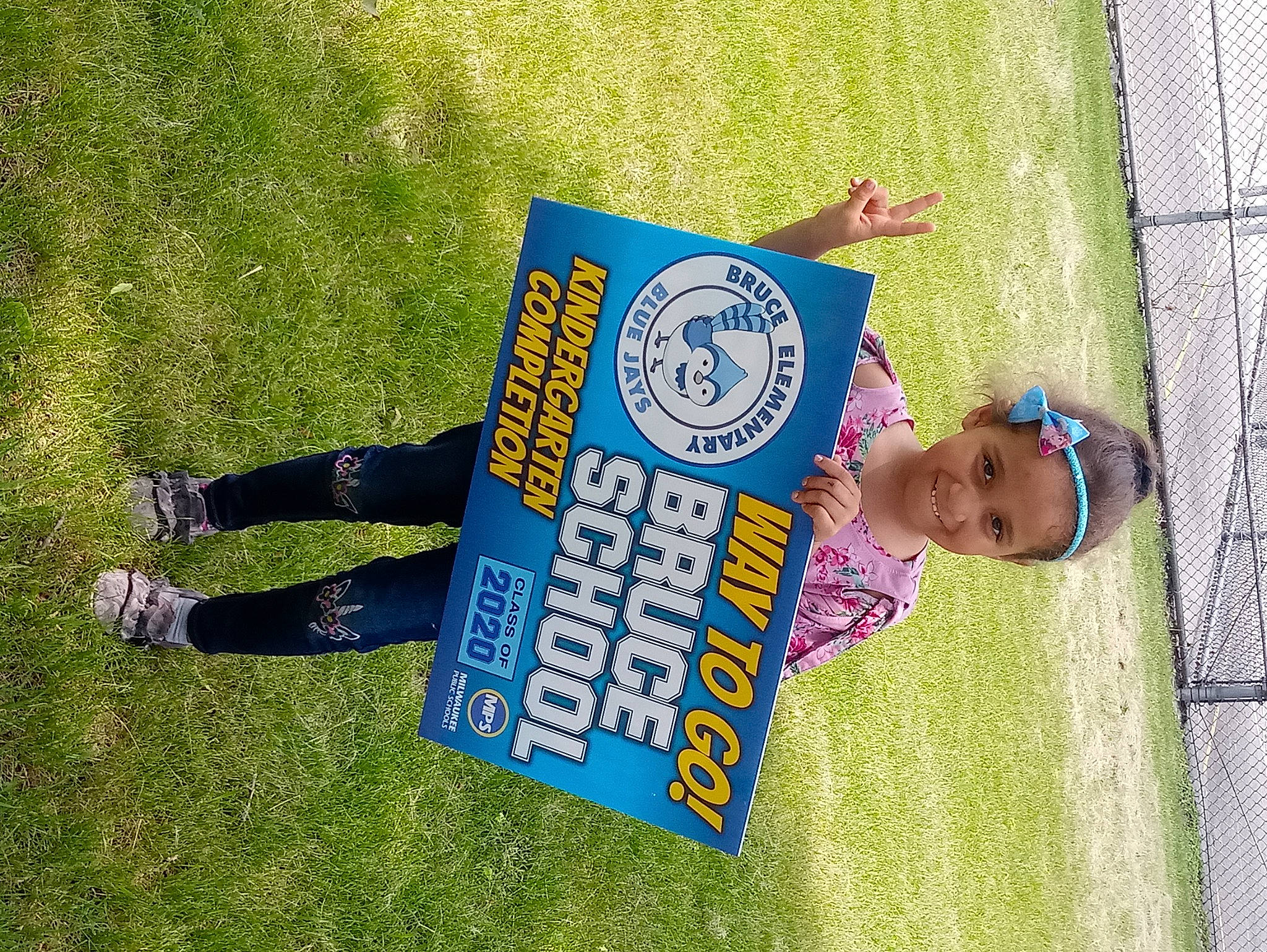 Essence is registered to the contest to win money with this photo: advertising, grass, happy, headwear, joy, lawn, person, sock