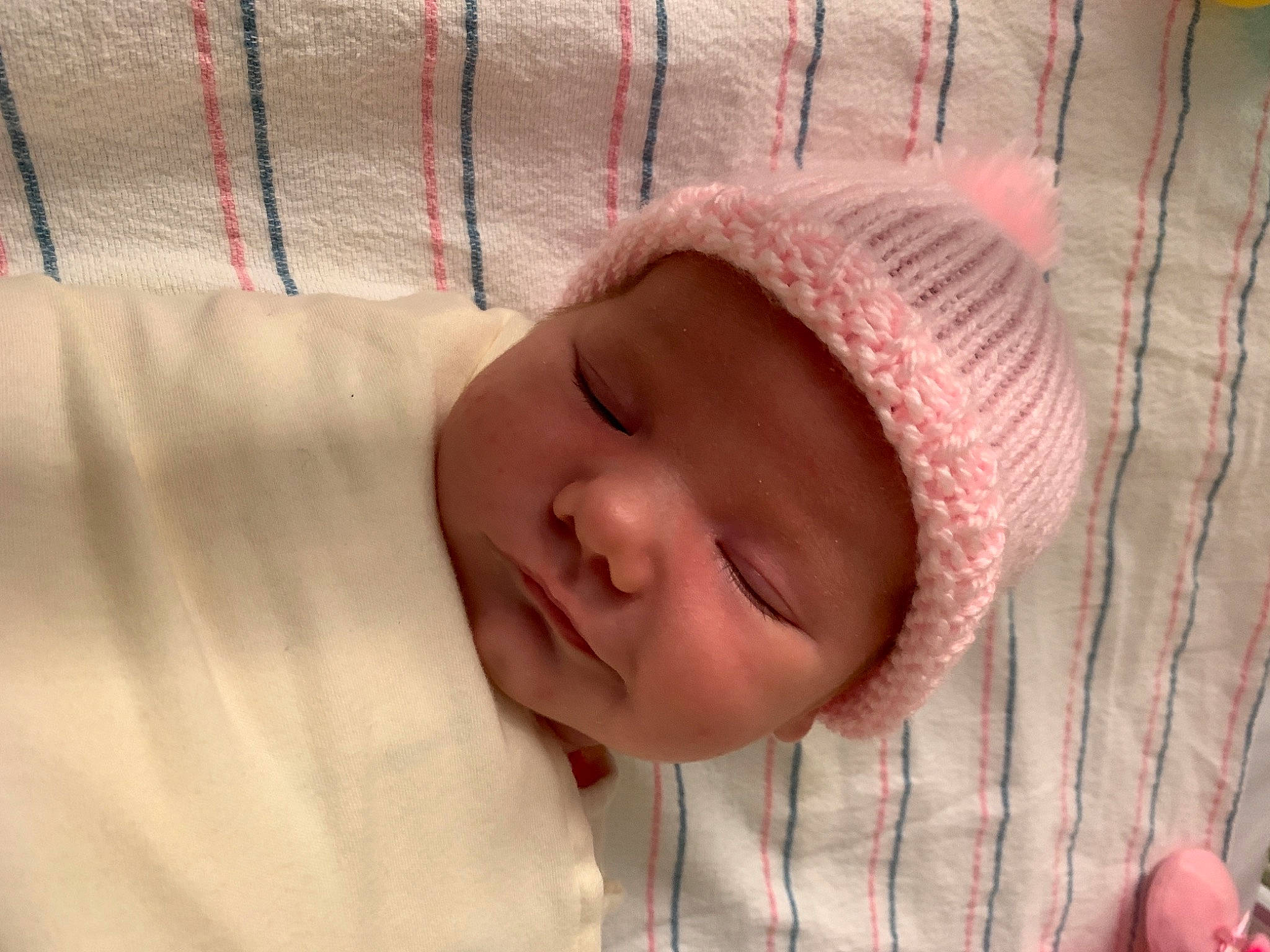 Averi joined the competition — help win amazing prizes! baby, baby_toddler_clothing, bedtime, cheek, child, comfort, eye, eyebrow, finger, head, headwear, infant_bed, iris, linens, lip, nose, person, pink, skin, smile