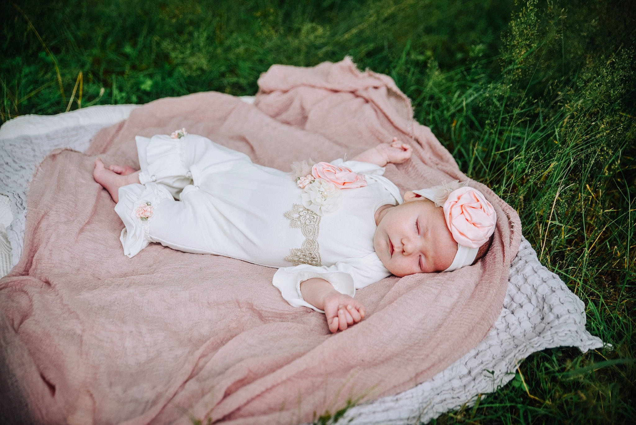 Averi is registered to the contest to win money with this photo: baby, baby_toddler_clothing, child, comfort, eye, flash_photography, grass, grass_family, grassland, happy, head, headwear, linens, people_in_nature, person, pink, plant, portrait_photography, sitting, sleep