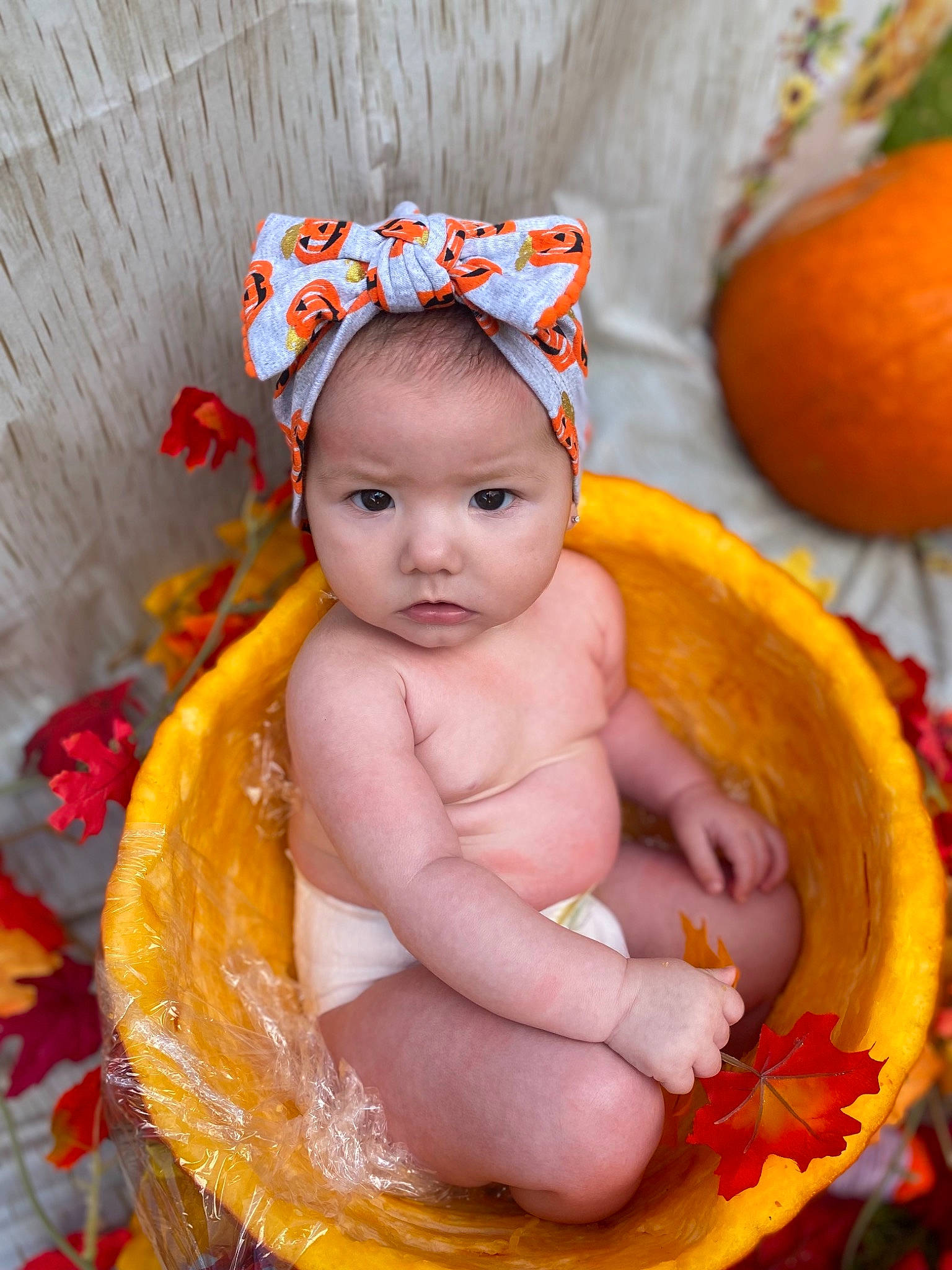 Averi Mae joined the competition — help win amazing prizes! baby, baby_products, baby_toddler_clothing, calabaza, child, cucurbita, eye, facial_expression, fruit, fun, gourd, happy, head, headwear, natural_foods, orange, person, plant, pumpkin, toddler