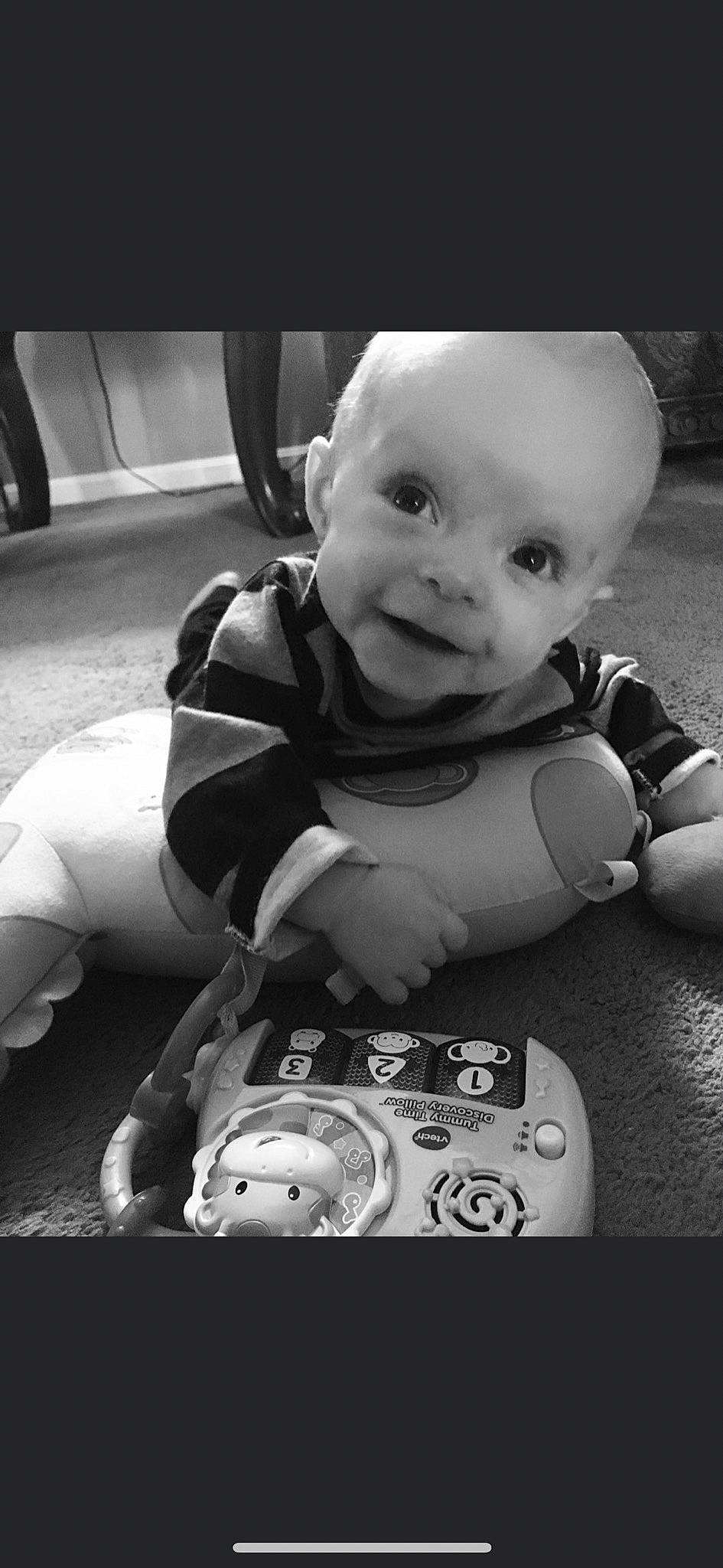 Garland joined the competition — help win amazing prizes! baby, baby_toddler_clothing, black, black_and_white, child, face, flash_photography, flooring, fun, game_controller, happy, input_device, monochrome, monochrome_photography, person, photograph, smile, snapshot, style, toddler