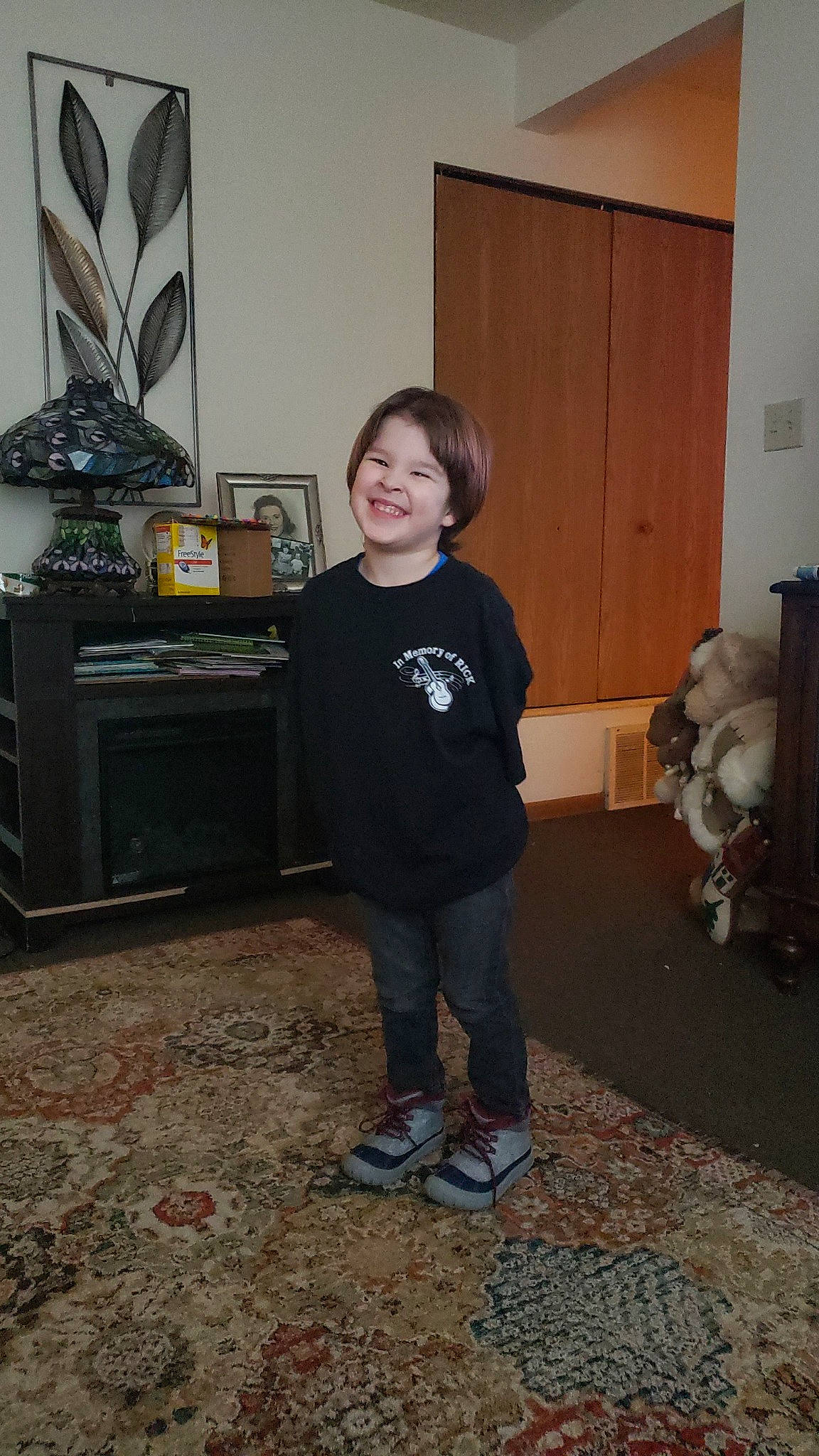 Jiraiya joined the competition — help win amazing prizes! audio_equipment, boot, cabinetry, child, cupboard, door, floor, flooring, fun, hardwood, home_appliance, joy, machine, person, room, sleeve, smile, sneakers, standing, t_shirt