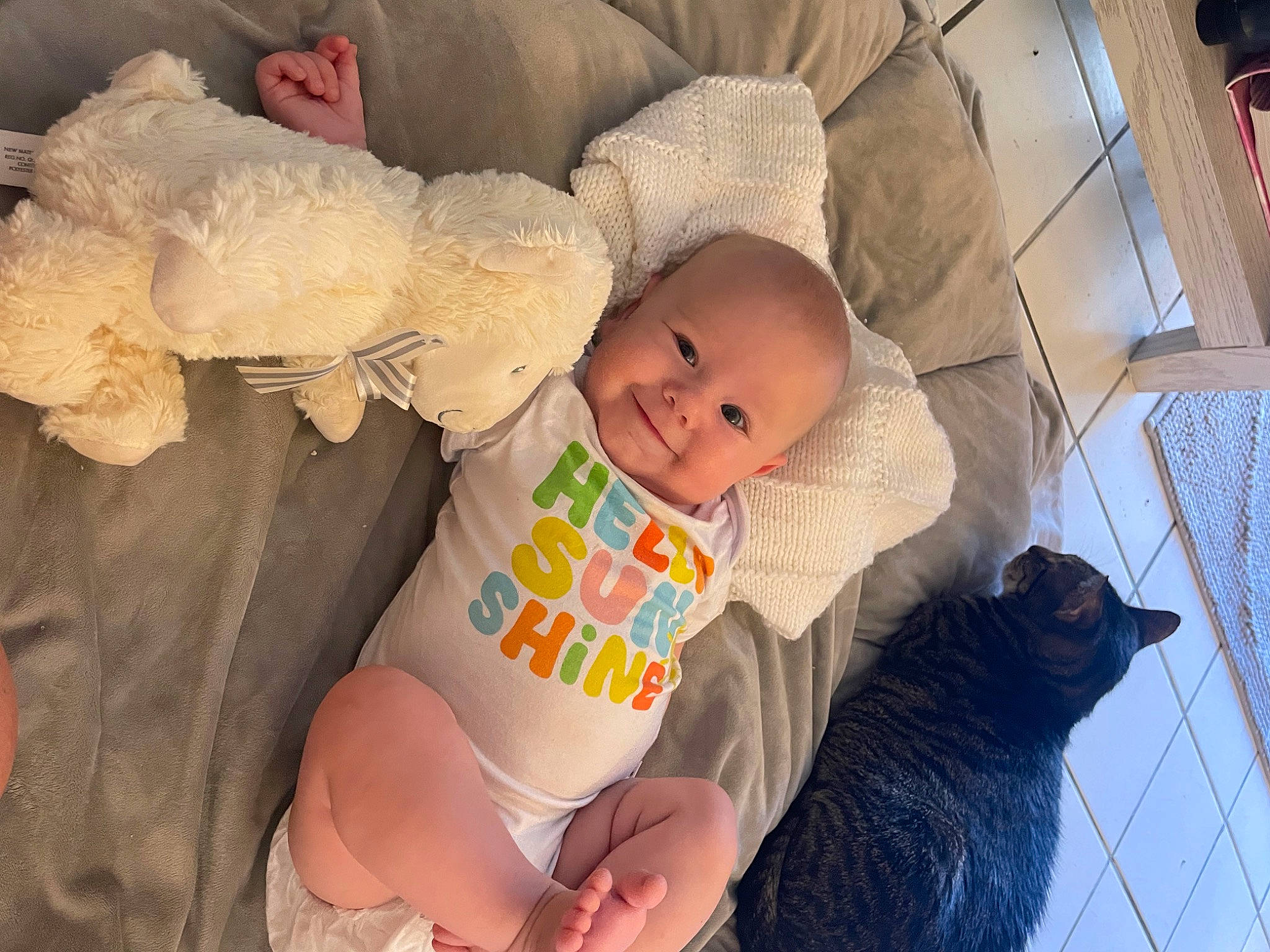 Kayleigh joined the competition — help win amazing prizes! baby, baby_products, baby_sleeping, baby_toddler_clothing, cat, cheek, child, comfort, domestic_short_haired_cat, felidae, fur, happy, hat, joy, person, room, sitting, skin, small_to_medium_sized_cats, smile