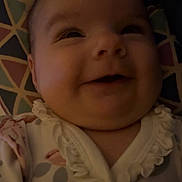 Salem Eleanor joined the competition — help win amazing prizes! baby, cheeks, child, closeup, clothing, cute, expression, face, happy, head, human, indoors, infant, joy, patterned_background, person, portrait, sleepwear, smile, young