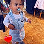 Chayna a rejoint le concours — aidez-le/la à gagner de superbes lots ! toddler, child, pacifier, pigtails, denim_dress, minnie_mouse, indoor, flooring, shoes, cute, standing, home, coat, jacket, toy, furniture, heart_emoji, person, young_child, playful