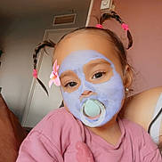 Chayna a rejoint le concours — aidez-le/la à gagner de superbes lots ! braided_hair, casual_clothing, child, close_up, cozy, cute, face_mask_filter, flower_sticker, happy, home, indoor, pacifier, person, pigtails, pink_sweatshirt, portrait, skin_care_filter, smiling_eyes, toddler, young_child