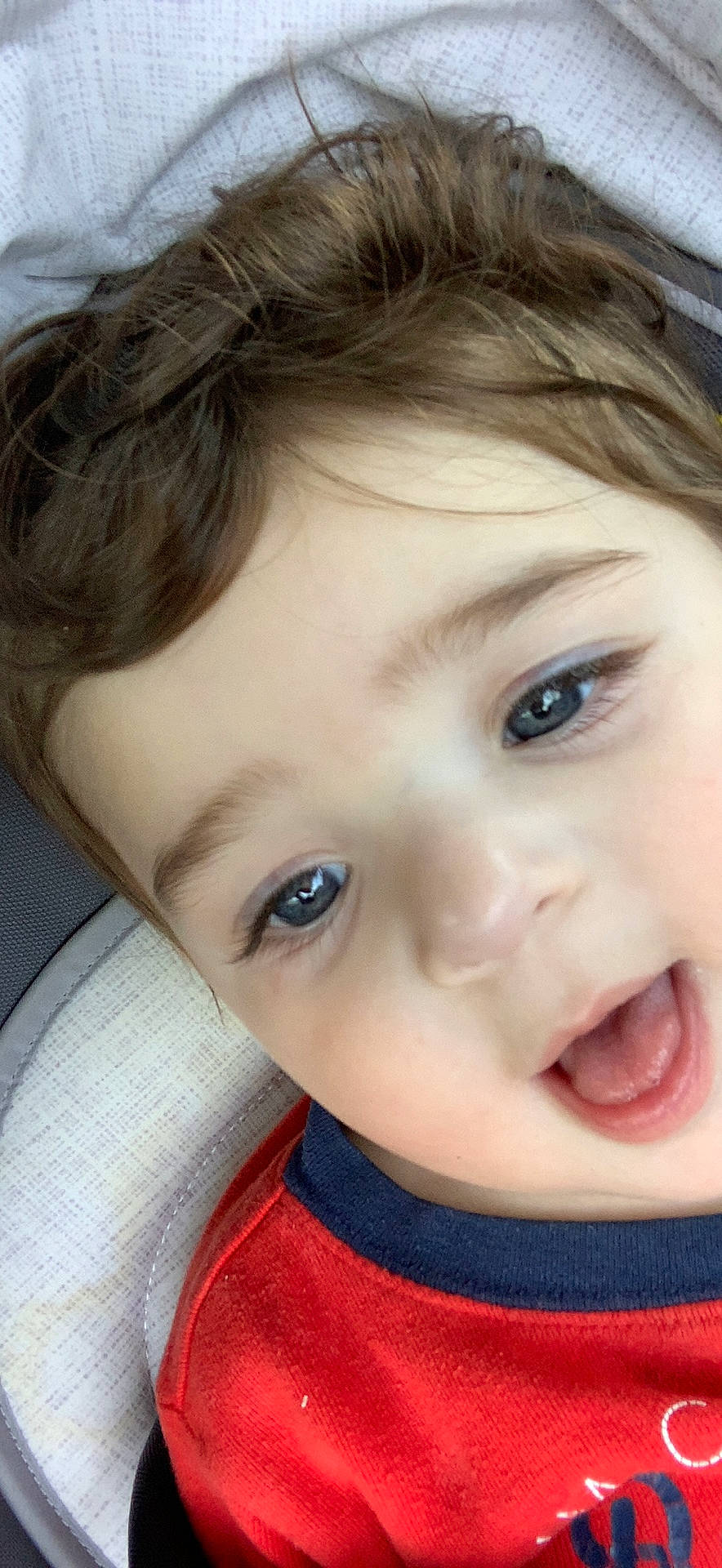 Eliam is registered to the contest to win money with this photo: brown_hair, cheek, child, chin, close_up, ear, eyebrow, eyelash, forehead, happy, iris, jaw, lip, mouth, neck, no_expression, nose, organ, person, skin