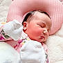 Luna Rose joined the competition — help win amazing prizes! baby, newborn, sleeping, pajamas, mittens, pink_pillow, plush, blanket, face, person, infant, cute, cozy, soft, resting, child, portrait, indoors, peaceful, head