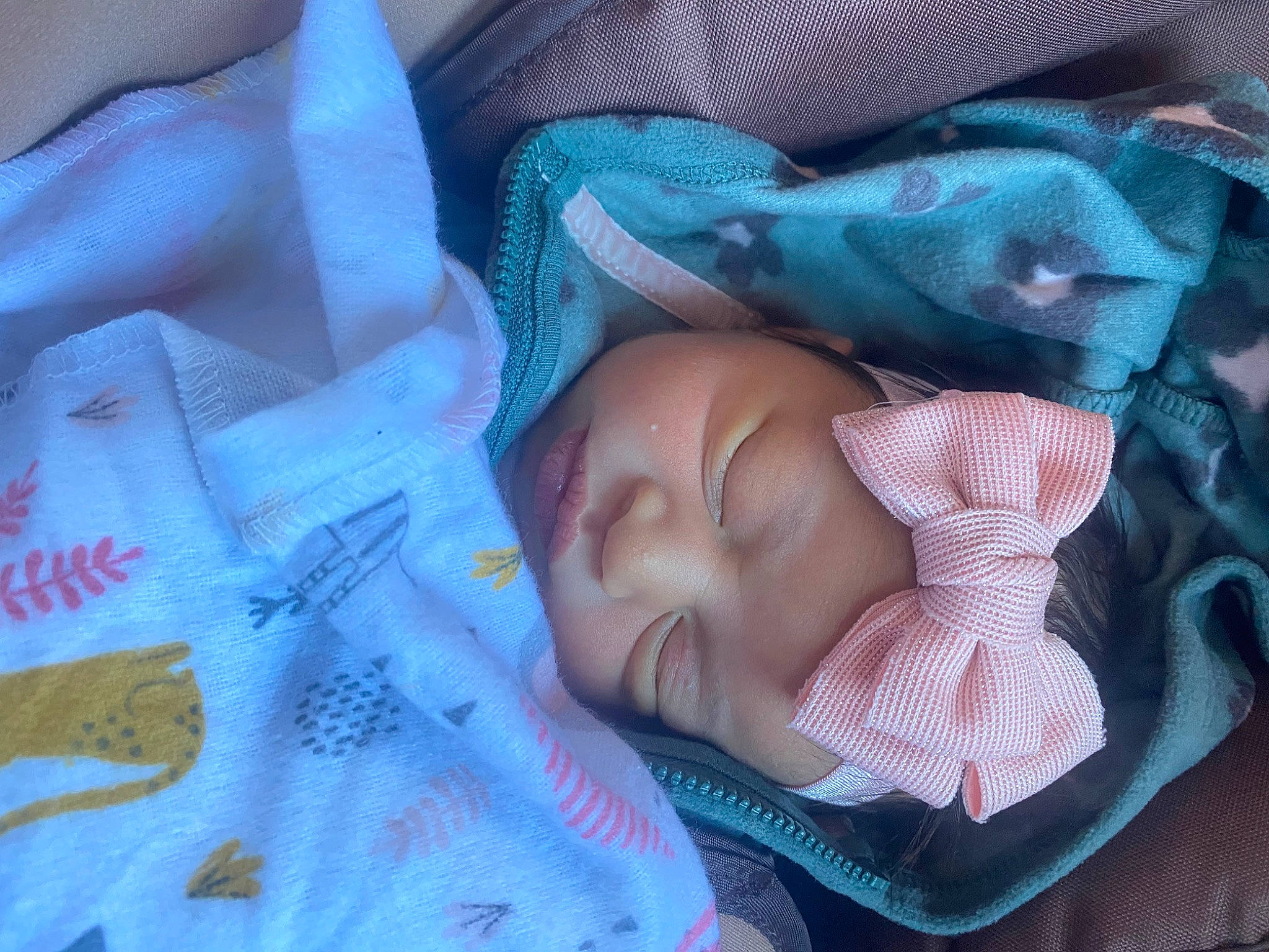 Stella Rose joined the competition — help win amazing prizes! baby, baby_products, baby_toddler_clothing, bedtime, cheek, child, close_up, comfort, electric_blue, hand, headwear, iris, linens, mouth, nap, person, product, purple, room, skin