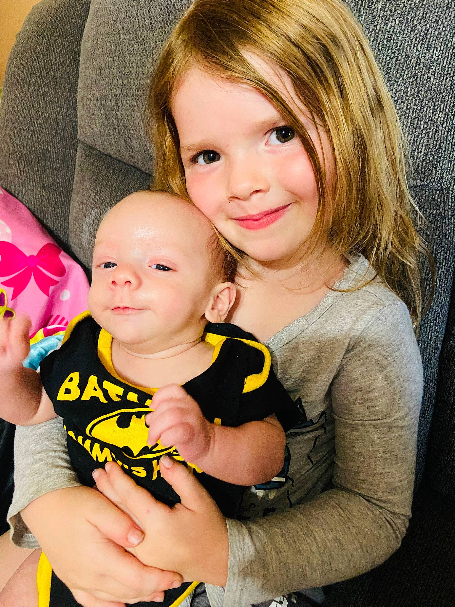 Myles is registered to the contest to win money with this photo: arm, baby_toddler_clothing, cheek, eye, facial_expression, fun, gesture, hand, happy, head, interaction, iris, joy, mammal, organ, person, sharing, skin, smile, t_shirt