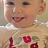 Hazelmarie is registered to the contest to win money with this photo: baby, child, clothing, cute, expression, eyes, face, happy, head, human, indoor, light, person, playful, portrait, shirt, smiling, toddler, tongue_out, young_child