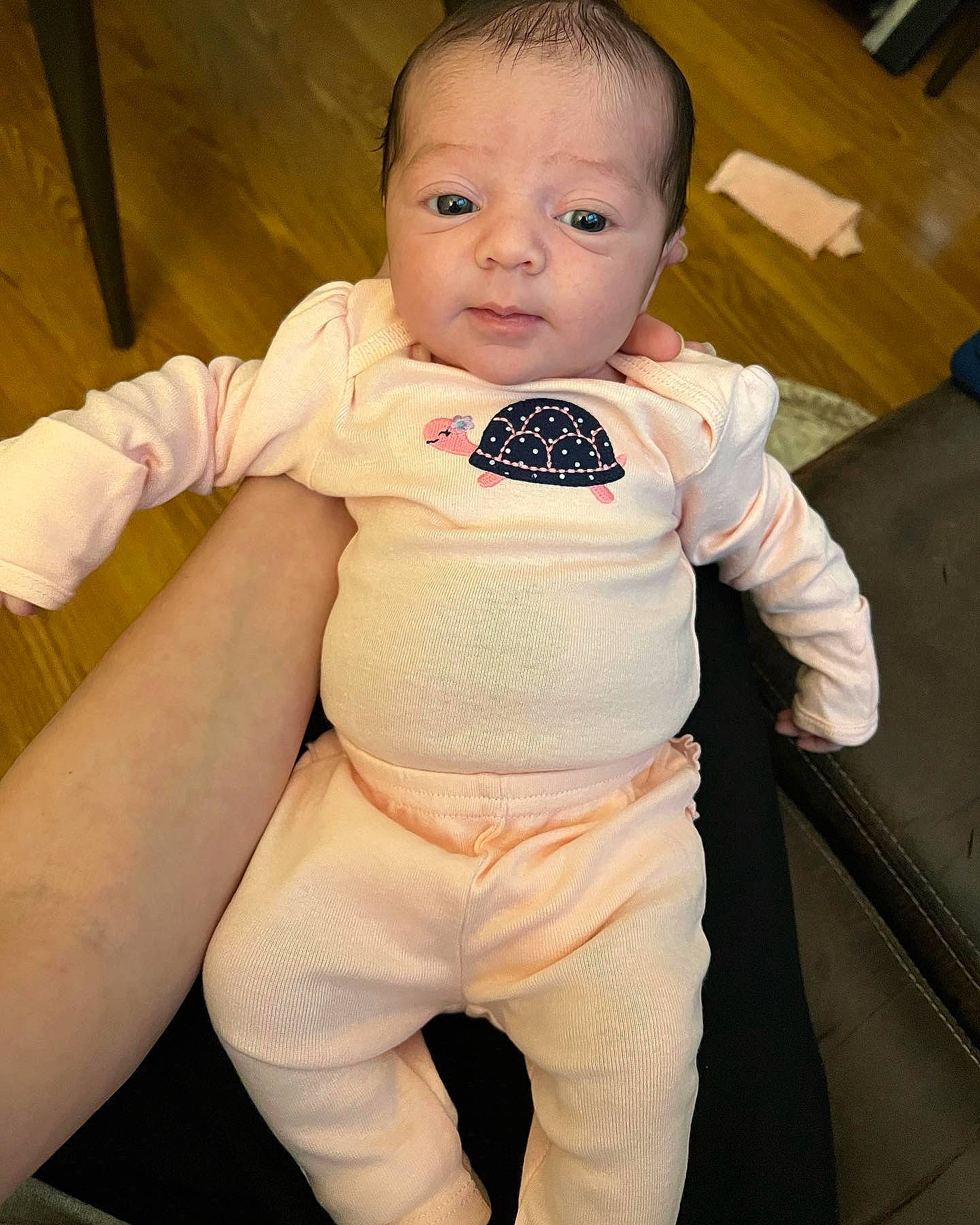 Nevaeh is registered to the contest to win money with this photo: abdomen, baby, baby_toddler_clothing, cheek, chin, comfort, finger, flooring, gesture, head, human_body, knee, lip, neck, nose, person, skin, sleeve, stomach, toddler