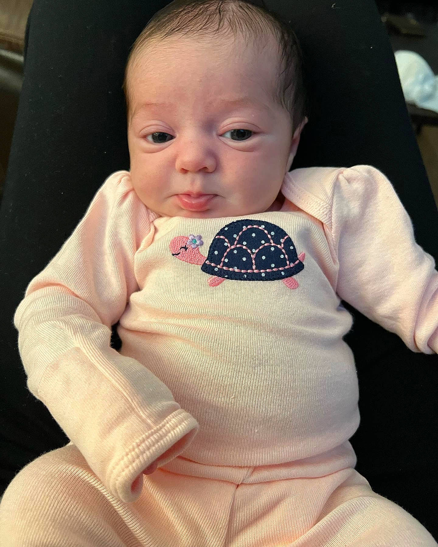 Nevaeh is registered to the contest to win money with this photo: arm, baby, baby_toddler_clothing, cheek, comfort, cool, eye, face, finger, hairstyle, happy, head, iris, lip, mouth, neck, nose, person, skin, sleeve