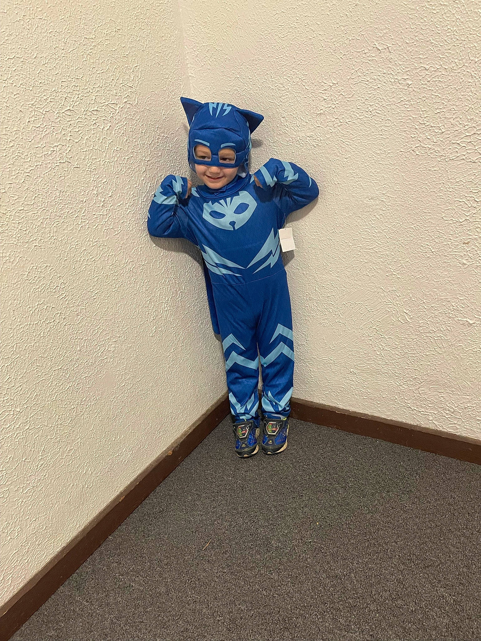 Marco is registered to the contest to win money with this photo: art, baby_toddler_clothing, carmine, denim, electric_blue, fictional_character, flooring, gesture, happy, headwear, jersey, joy, outerwear, person, personal_protective_equipment, player, sleeve, sportswear, street_fashion, t_shirt