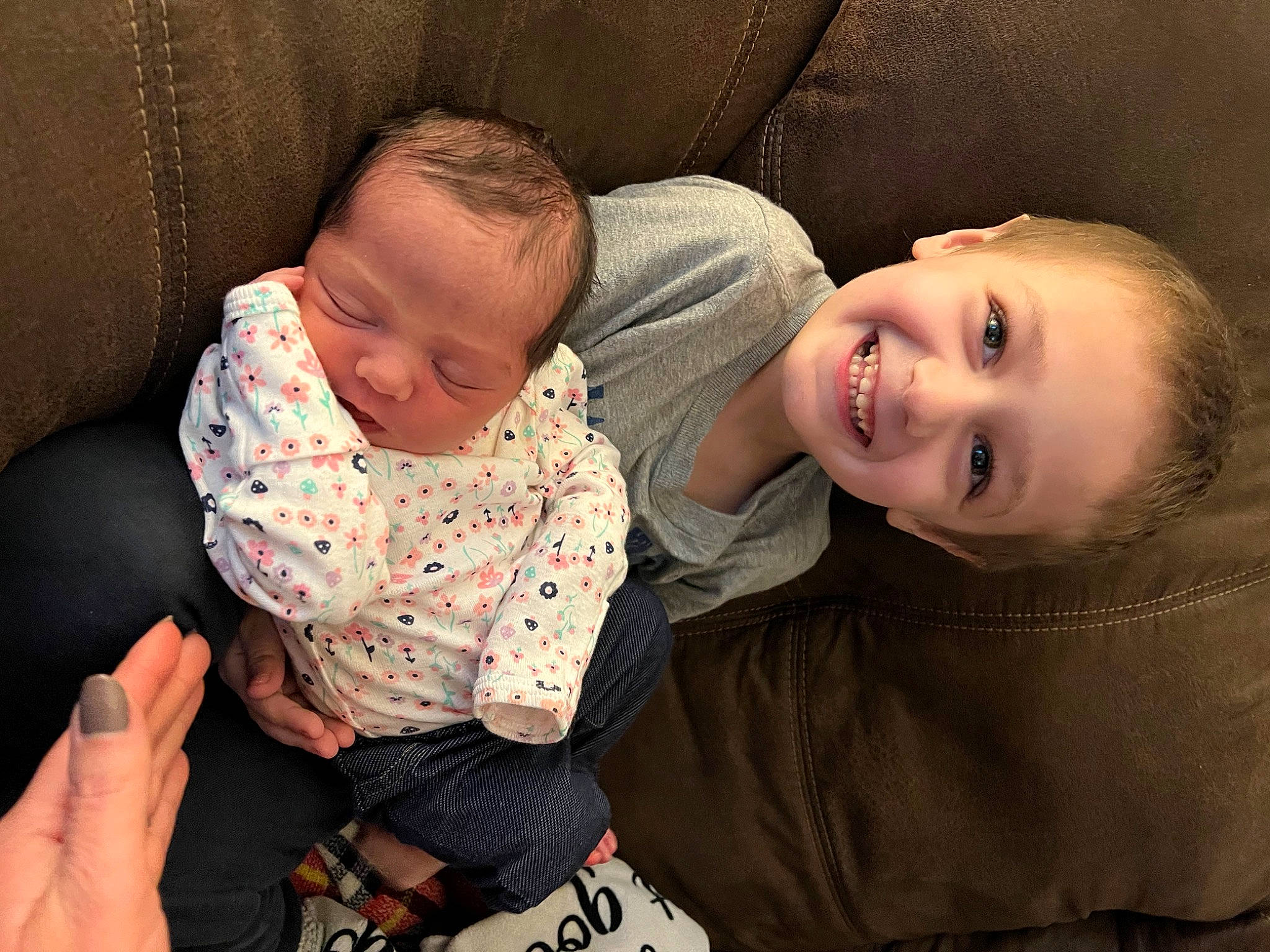 Marco is registered to the contest to win money with this photo: baby, baby_toddler_clothing, cheek, child, comfort, face, finger, flash_photography, hairstyle, hand, happy, head, iris, joy, lip, mouth, nose, person, skin, sleeve